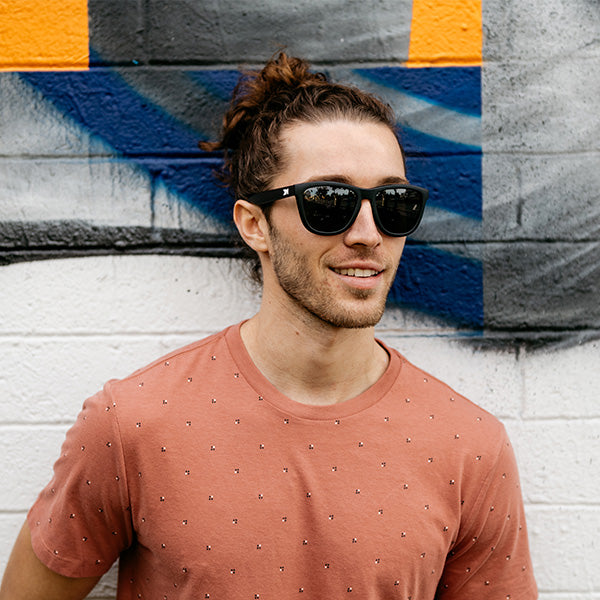 Man wearing Black / Smoke Premiums Sunglasses