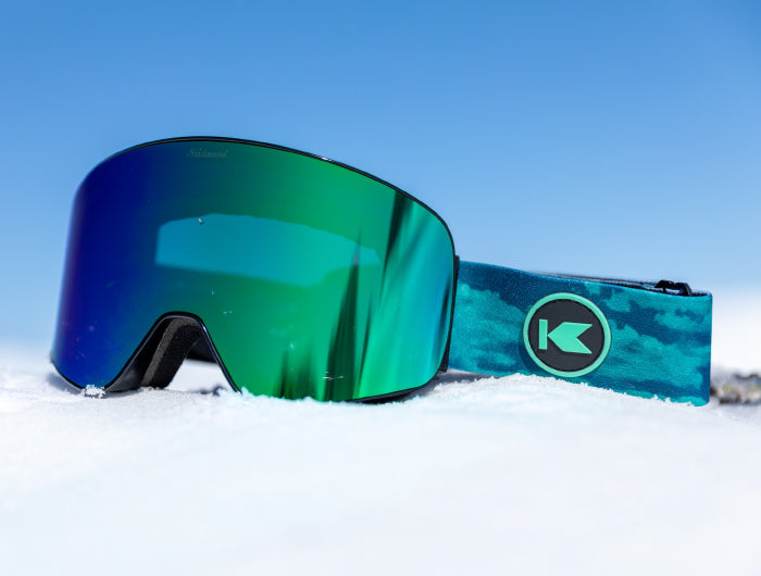 Slingshots snow goggles photographed in snow