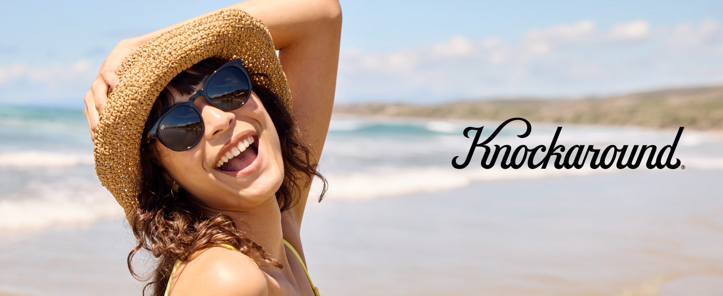 Tide Pools Knockaround Sunglasses. Photo features a women wearing Tide Pools sunglasses.