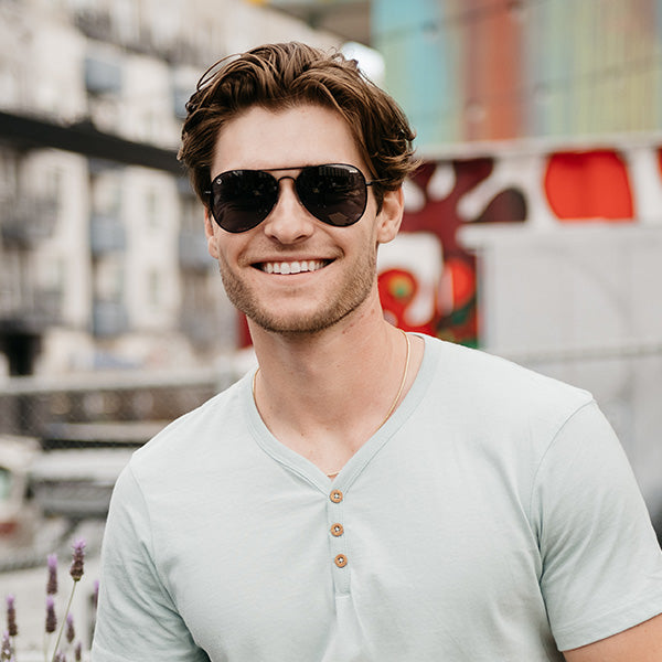 Man wearing Black on Black Mile Highs Sunglasses