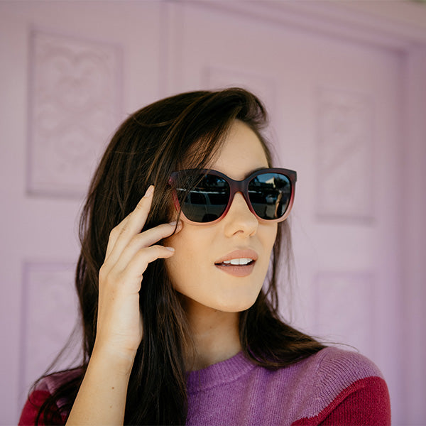 Woman wearing Knockaround Spanish Rose Deja Views Sunglasses