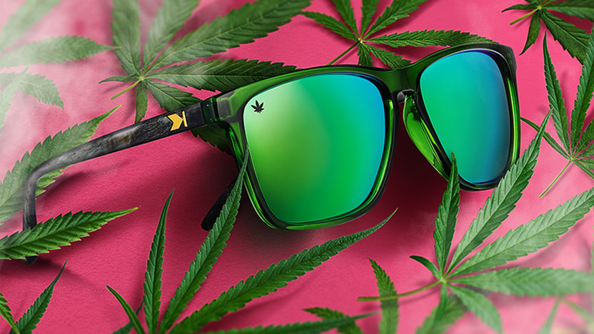 Sunglasses with Emerald haze front frame Translucent smoke puff arms Polarized ganja green lenses