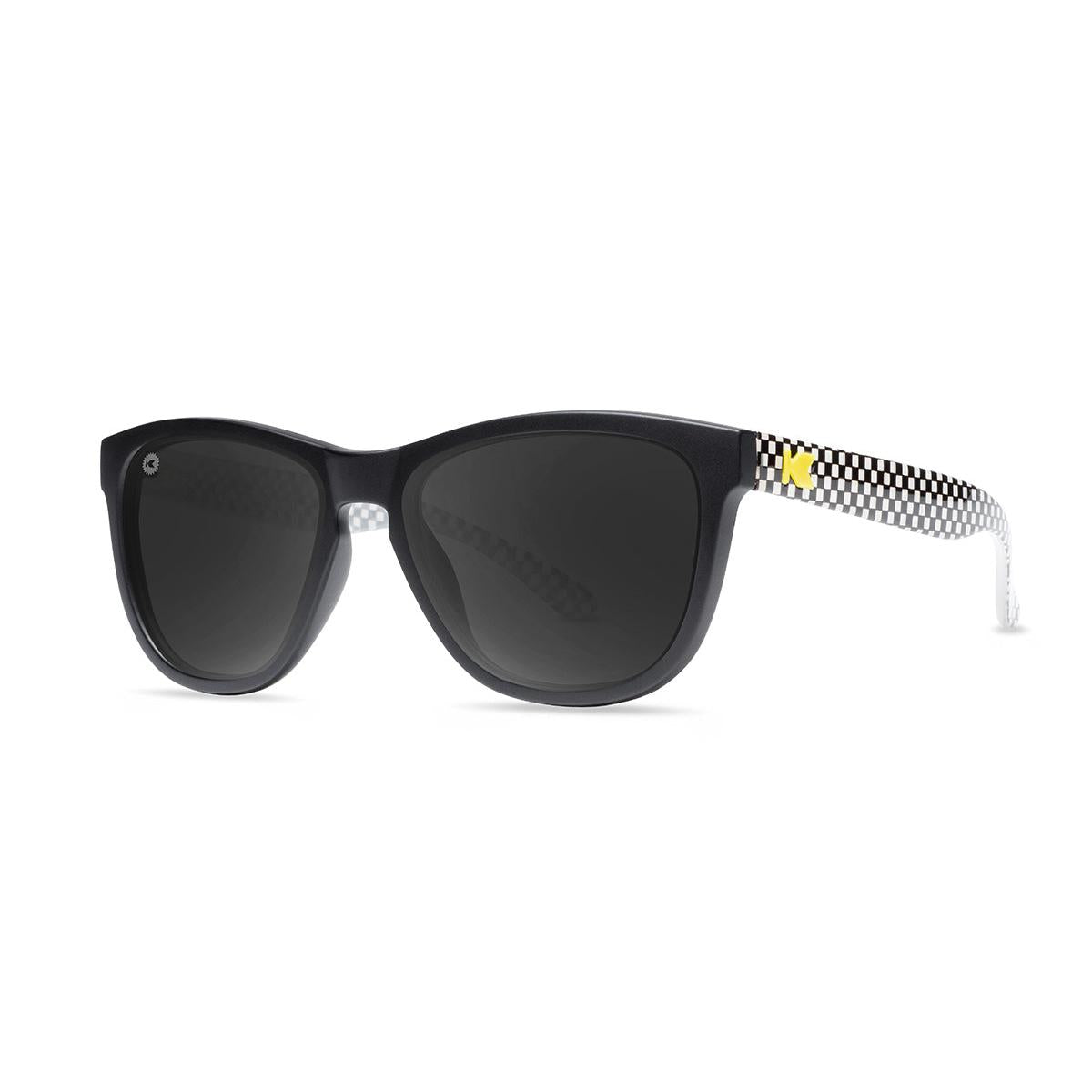 Kids Sunglasses with glossy Fronts and Checkerboard Arms with Polarized Black Smoke Lenses, Threequarter