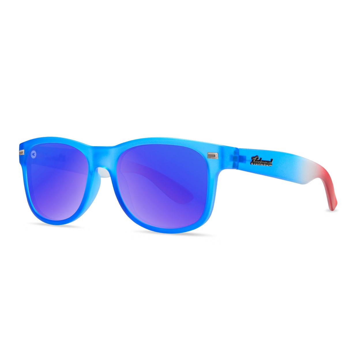 Sunglasses with Blue, White, and Red Frames and Polarized Moonshine Lenses, Threequarter
