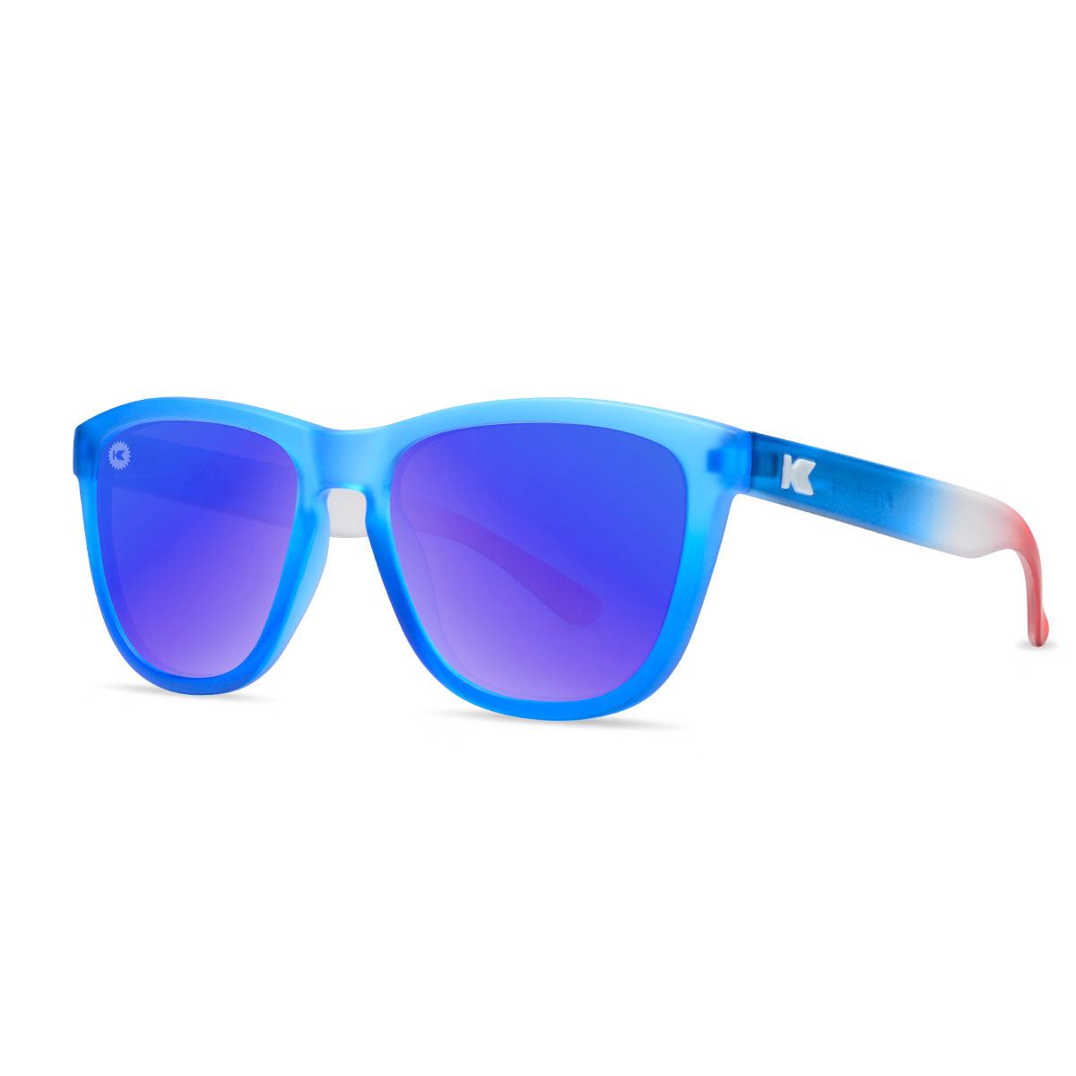Sunglasses with Blue, Red, and White Frames and Polarized Blue Moonshine Lenses, Threequarter