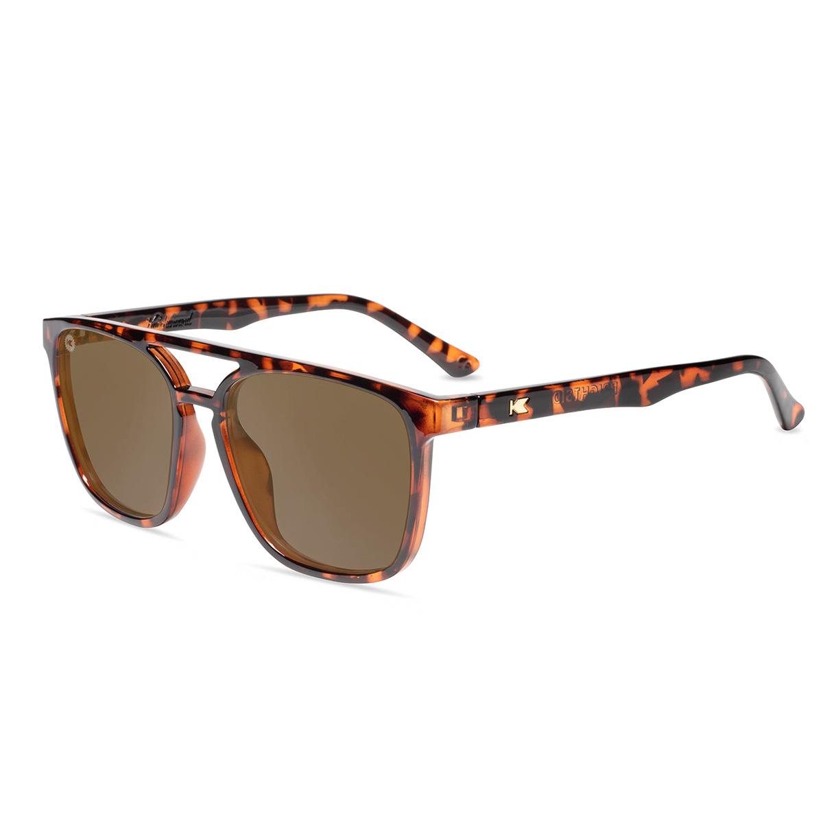 Sunglasses with Glossy Tortoise Shell Frames and Polarized Amber Lenses, Flyover