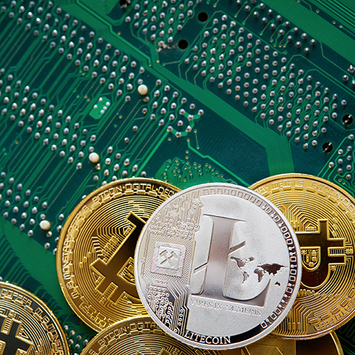 Stack of cryptocurrencies on motherboard