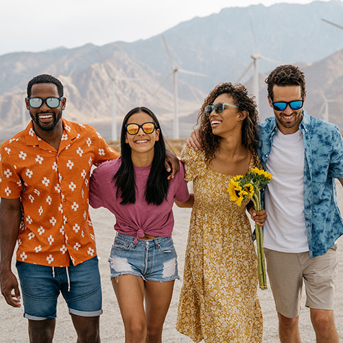 Four young people in Palm Springs wearing Knockaround sunglasses