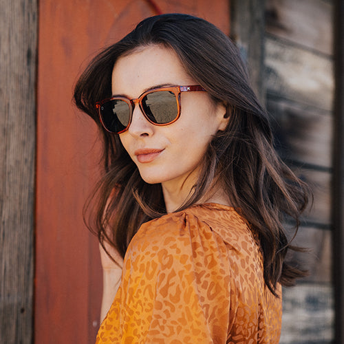 Woman wearing Knockaround Desert Glaze Paso Robles