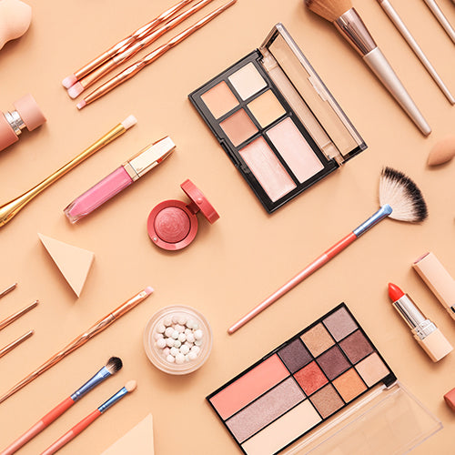 Set of makeup brushes with other makeup products