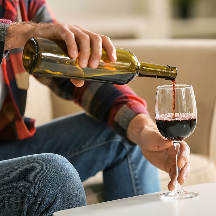 Pouring red wine