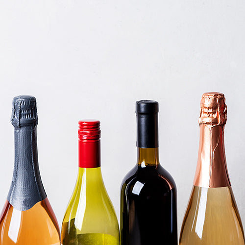 Tops of various wines and champagnes