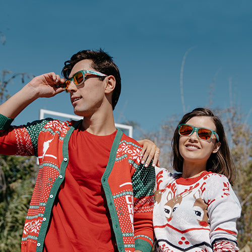 Two friends wearing Knockaround Ugly Sweater Fort Knocks sunglasses