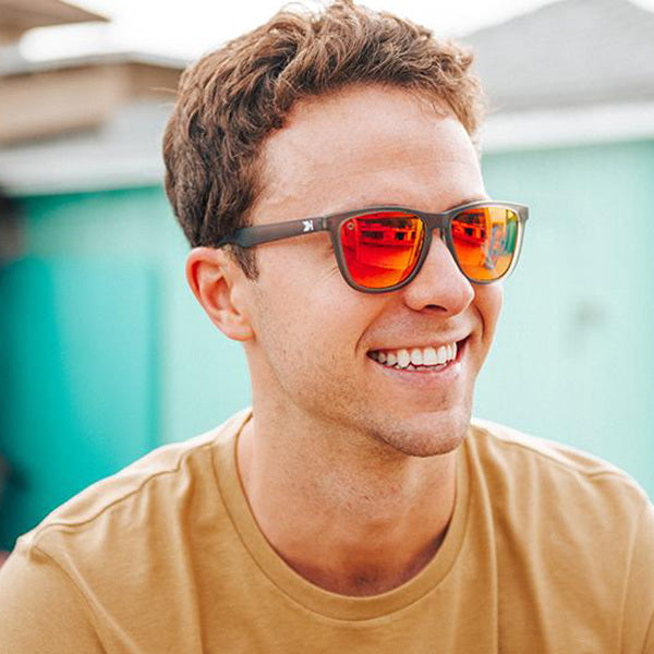 Man wearing Frosted Grey / Red Sunset Classics Sunglasses