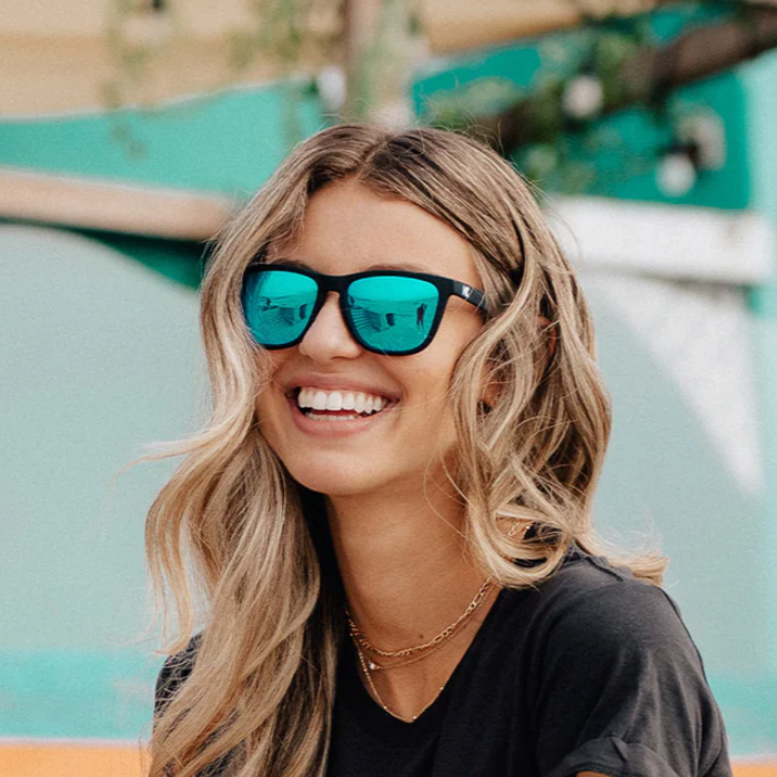 Women wearing Mirror Sunglasses