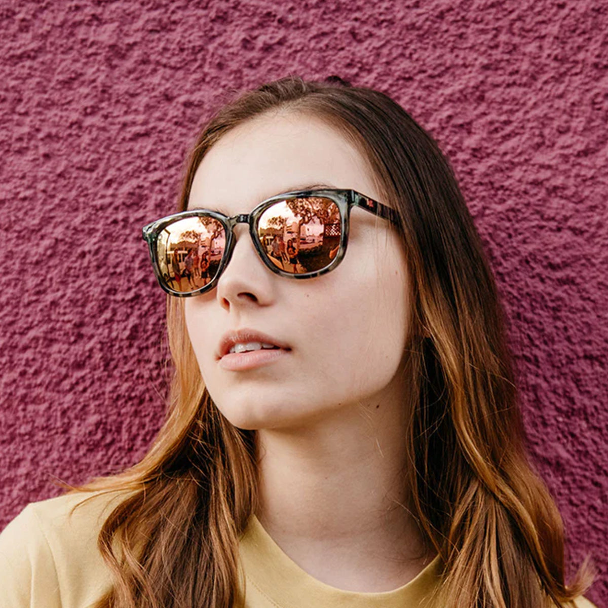 Woman wearing Knockaround Slate Tortoise Shell Rose Gold  Paso Robles Sunglasses 