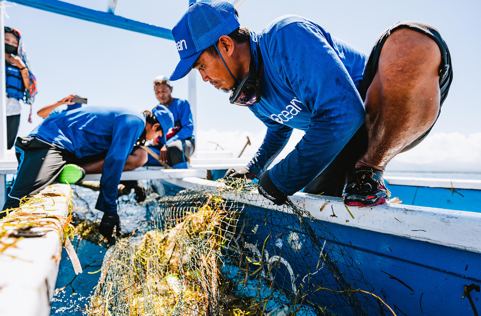 image of person with net full of plastic