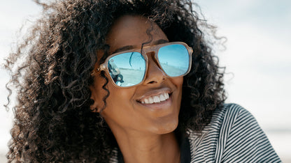 Sunglasses with Glossy Peach Frames and Polarized Snow Opal Lenses, Model