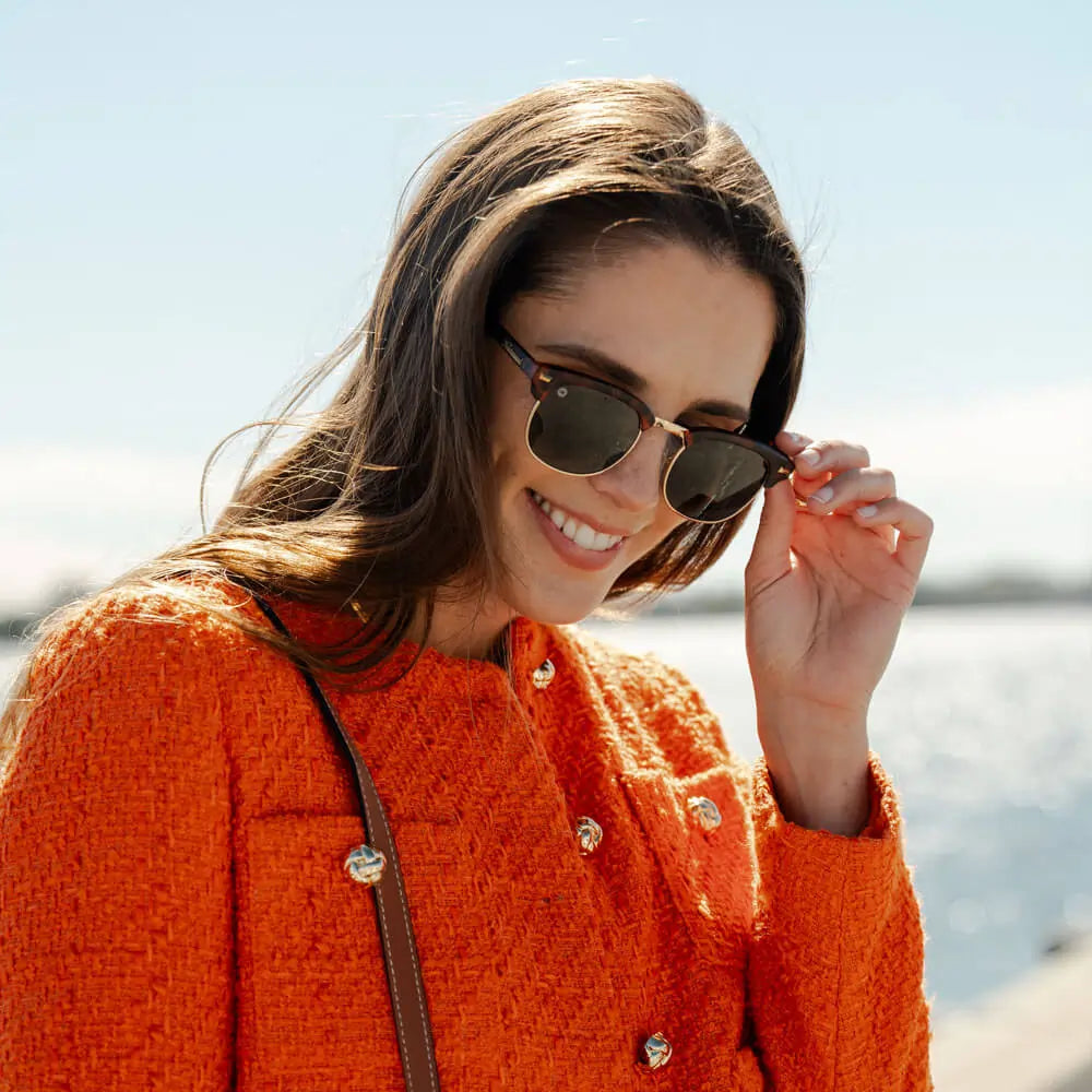 Woman wearing Matte Tortoise Shell & Gold Brooklines Sunglasses