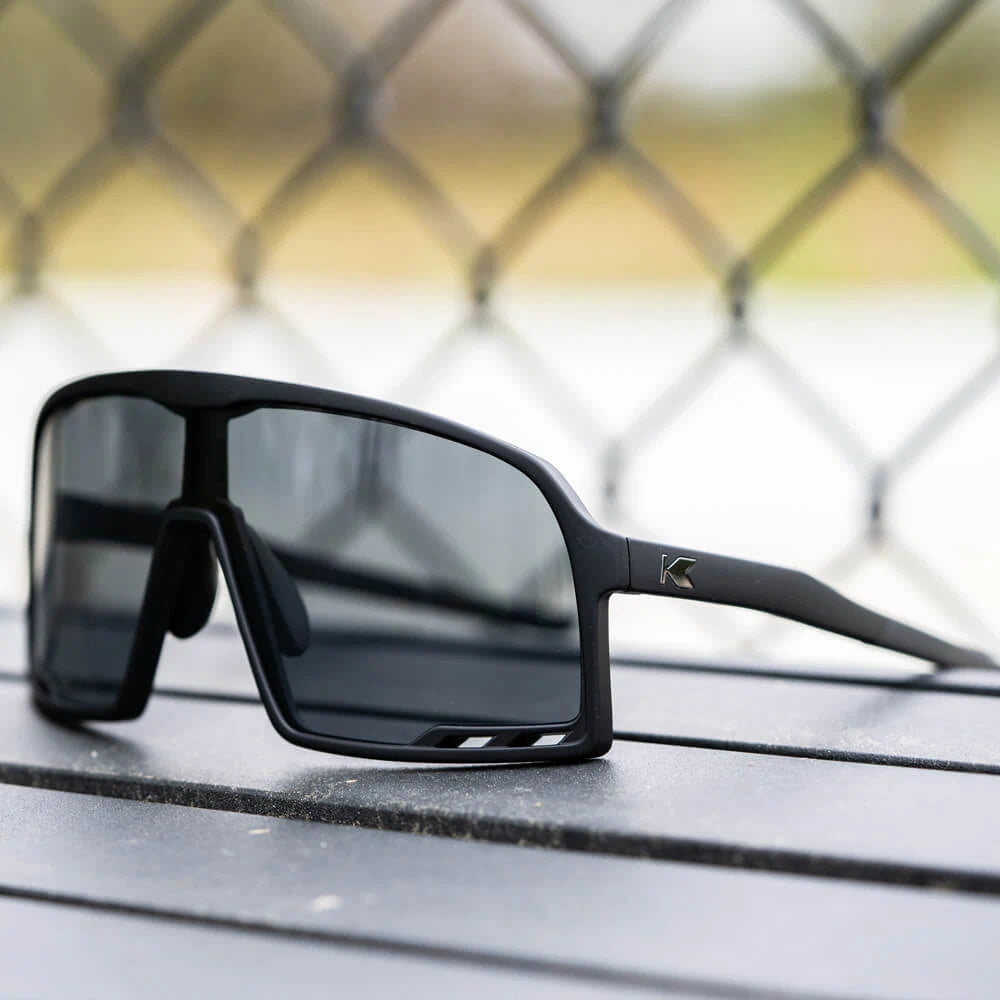 Lifestyle photo of Black on Black Campeones Sunglasses