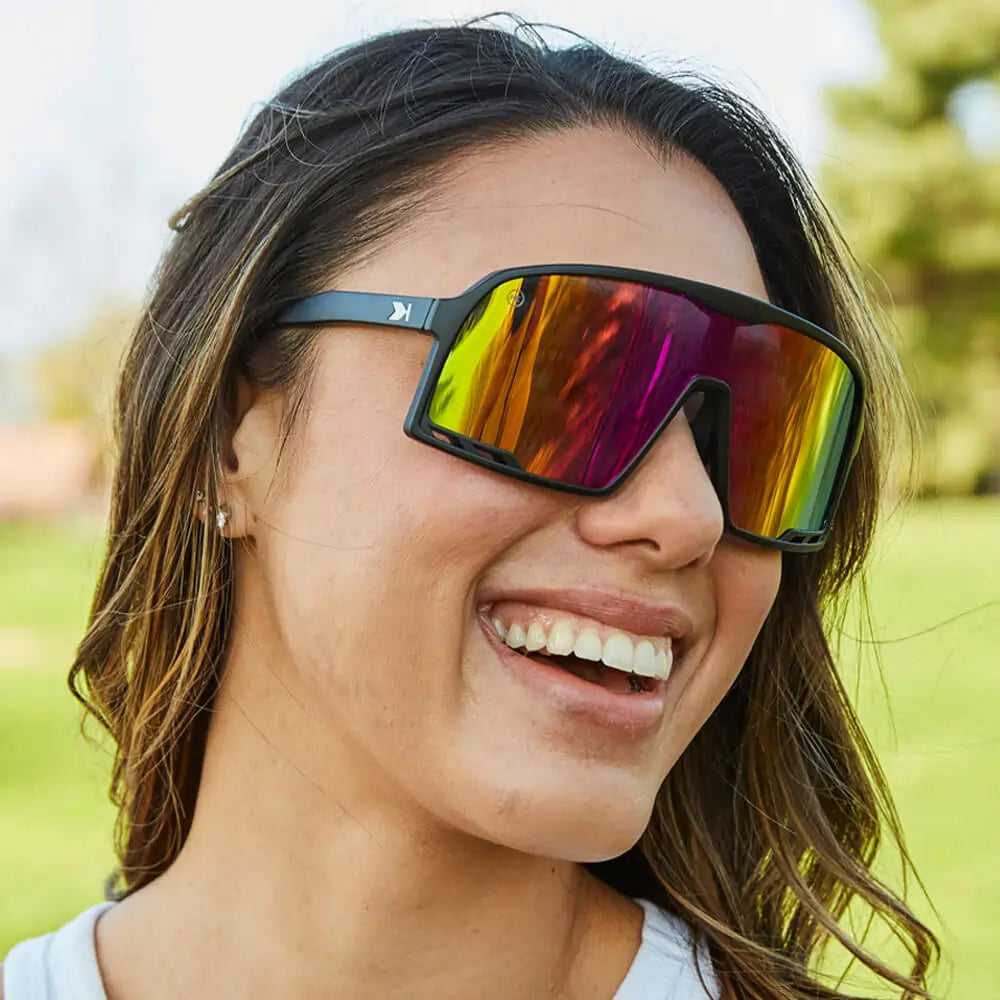Women wearing Rainbow on Black Campeones Sunglasses