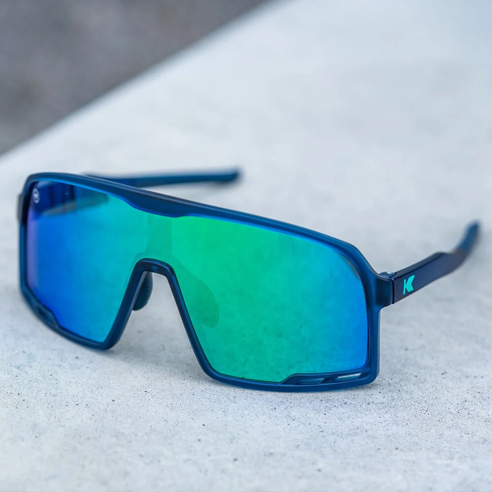 Lifestyle photo of Rubberized Navy / Mint Campeones Sunglasses