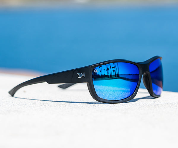 Midnight Ocean High Stakes salt protection sunglasses photographed outside