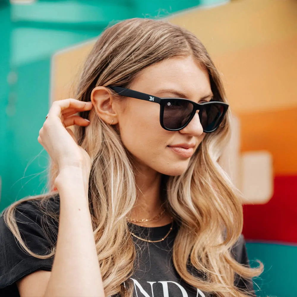Women wearing Black / Smoke Classics Sunglasses
