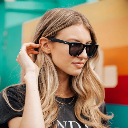 Women wearing Black / Smoke Classics Sunglasses