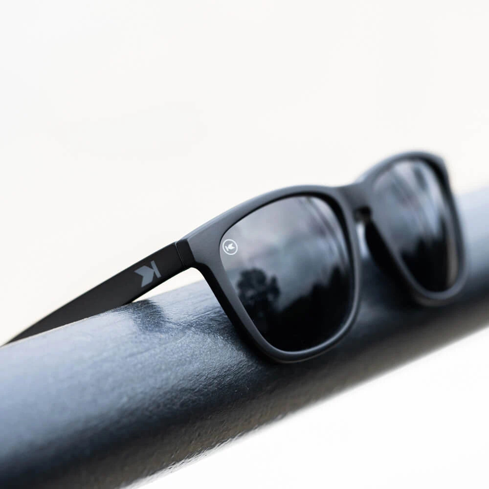 Lifestyle photo of Black on Black Classics Sunglasses
