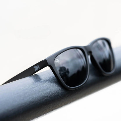 Lifestyle photo of Black on Black Classics Sunglasses