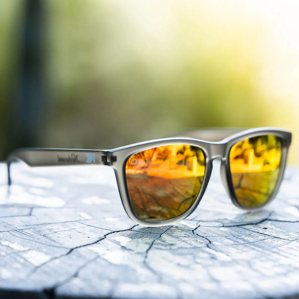 Lifestyle photo of Frosted Grey / Red Sunset Classics Sunglasses