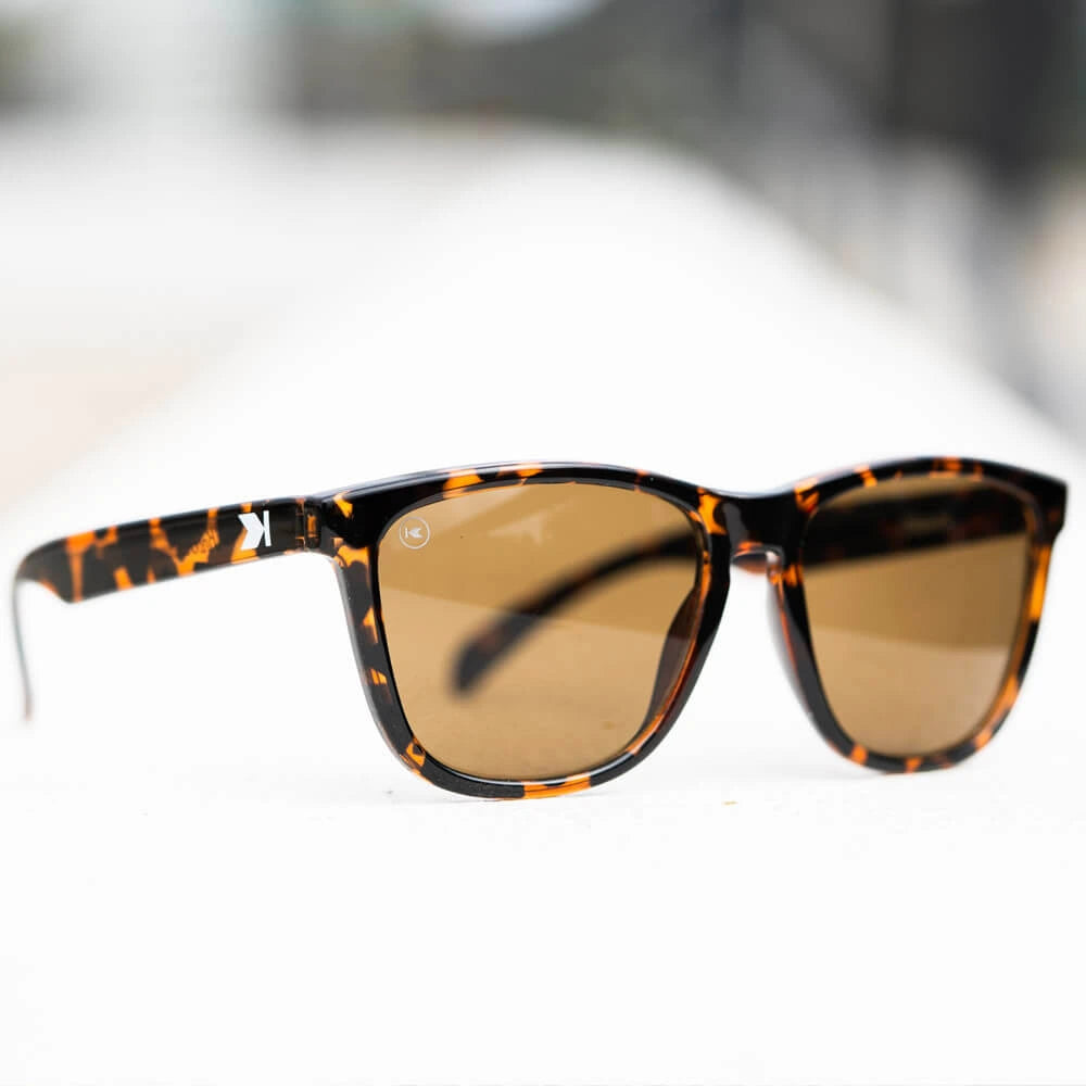 Lifestyle photo of Glossy Tortoise Shell / Amber Classics Sunglasses