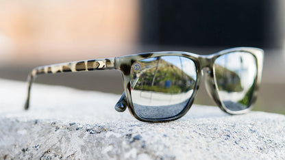 Lifestyle photo of Granite Tortoise Shell / Silver Smoke Fast Lanes Sunglasses