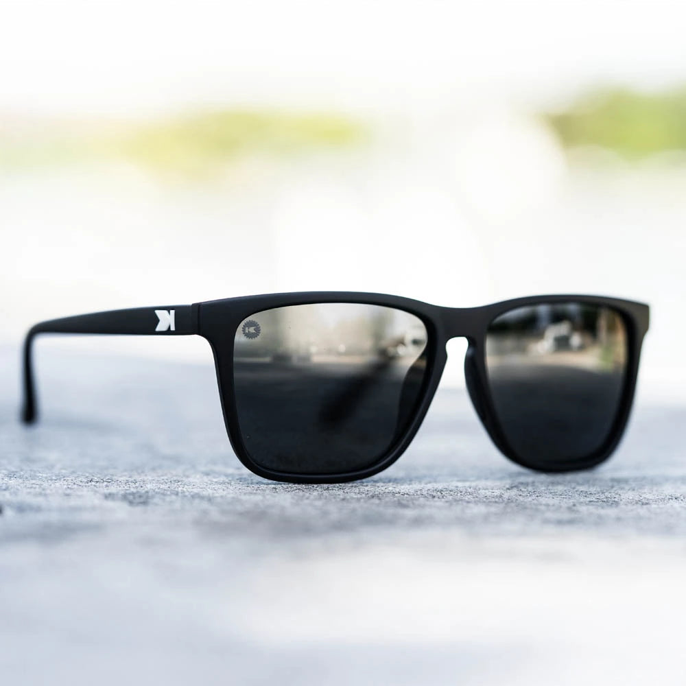 Lifestyle photo of Matte Black / Smoke Fast Lanes Sunglasses