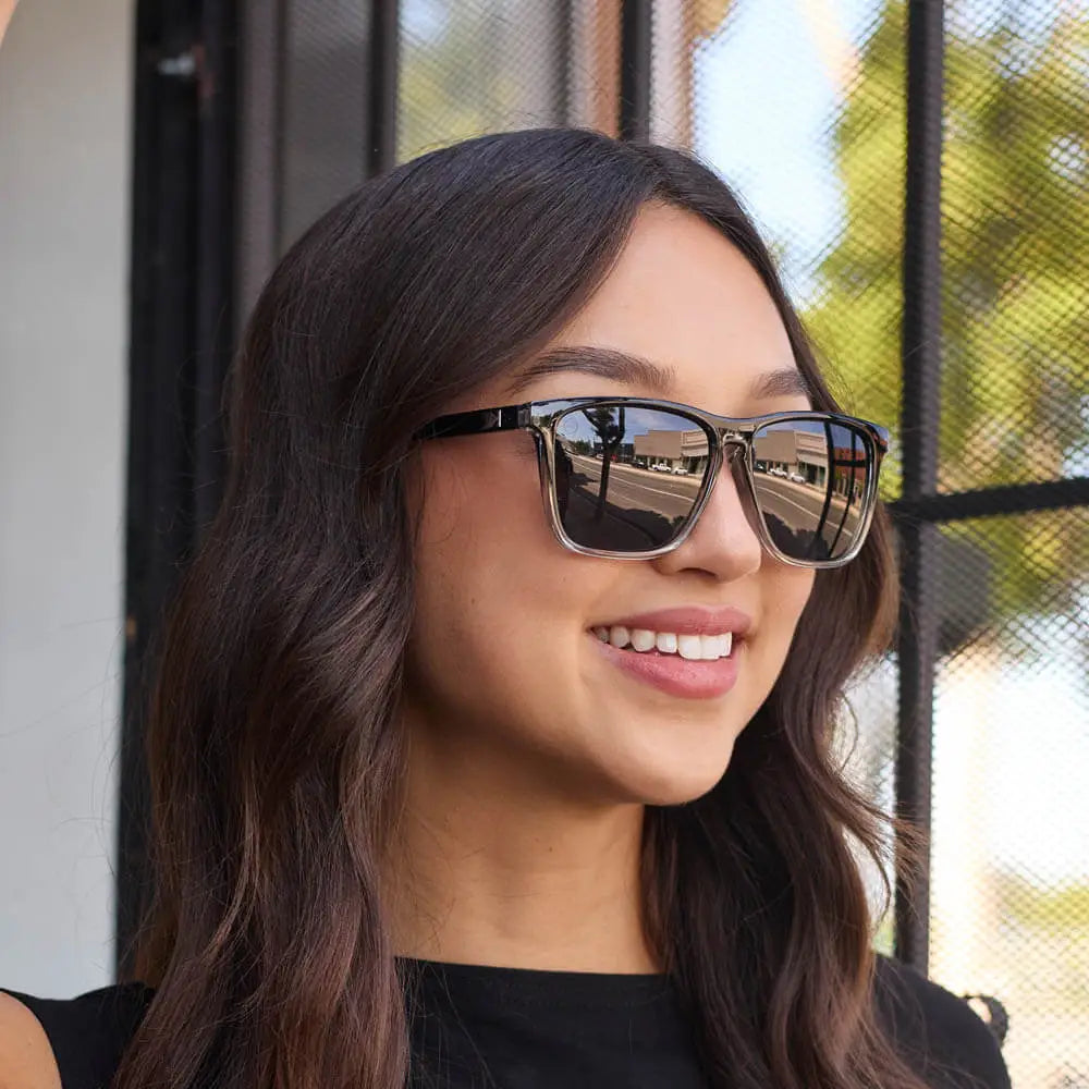 Women wearing Obsidian Fast Lanes Sunglasses