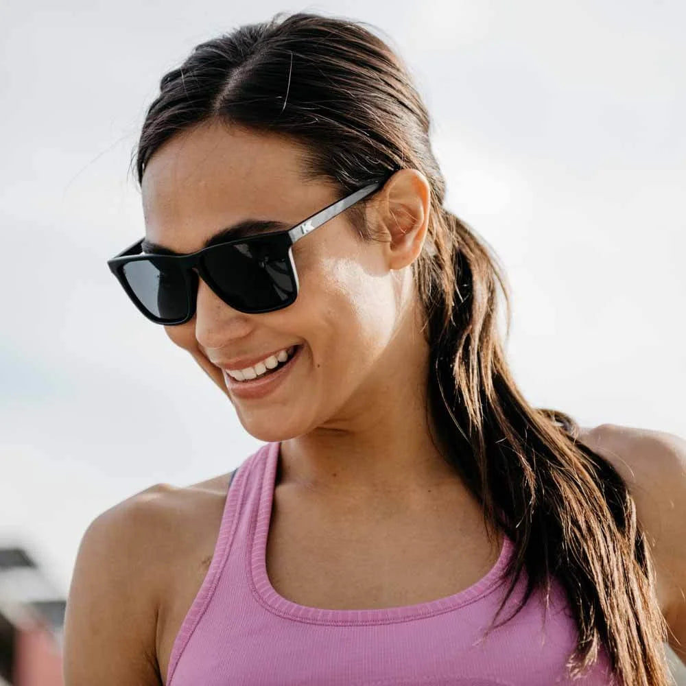 Women wearing Black / Smoke Fast Lanes Sport Sunglasses
