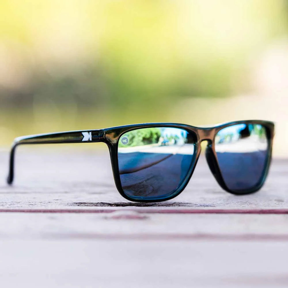 Lifestyle photo of Jelly Black / Sky Blue Fast Lanes Sport Sunglasses