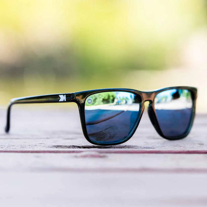 Lifestyle photo of Jelly Black / Sky Blue Fast Lanes Sport Sunglasses