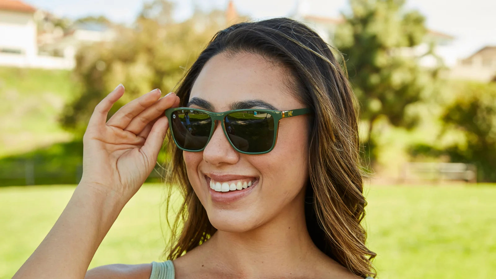 Women wearing Coyote Calls Fast Lanes Sunglasses