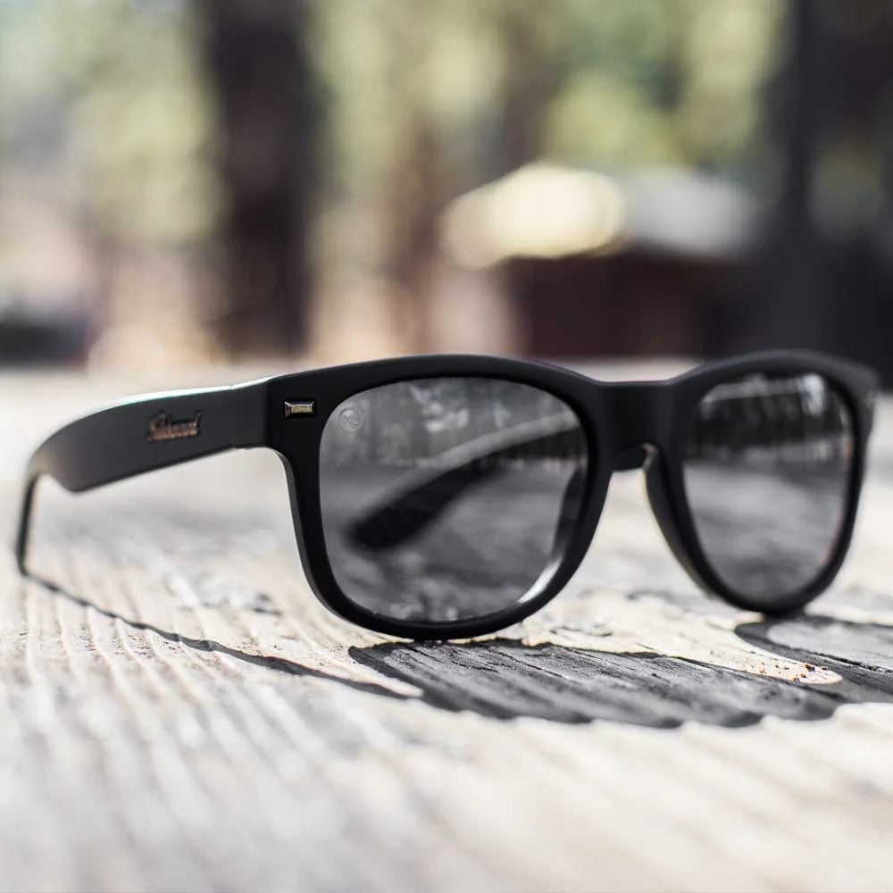 Lifestyle photo of Black on Black Fort Knocks Sunglasses