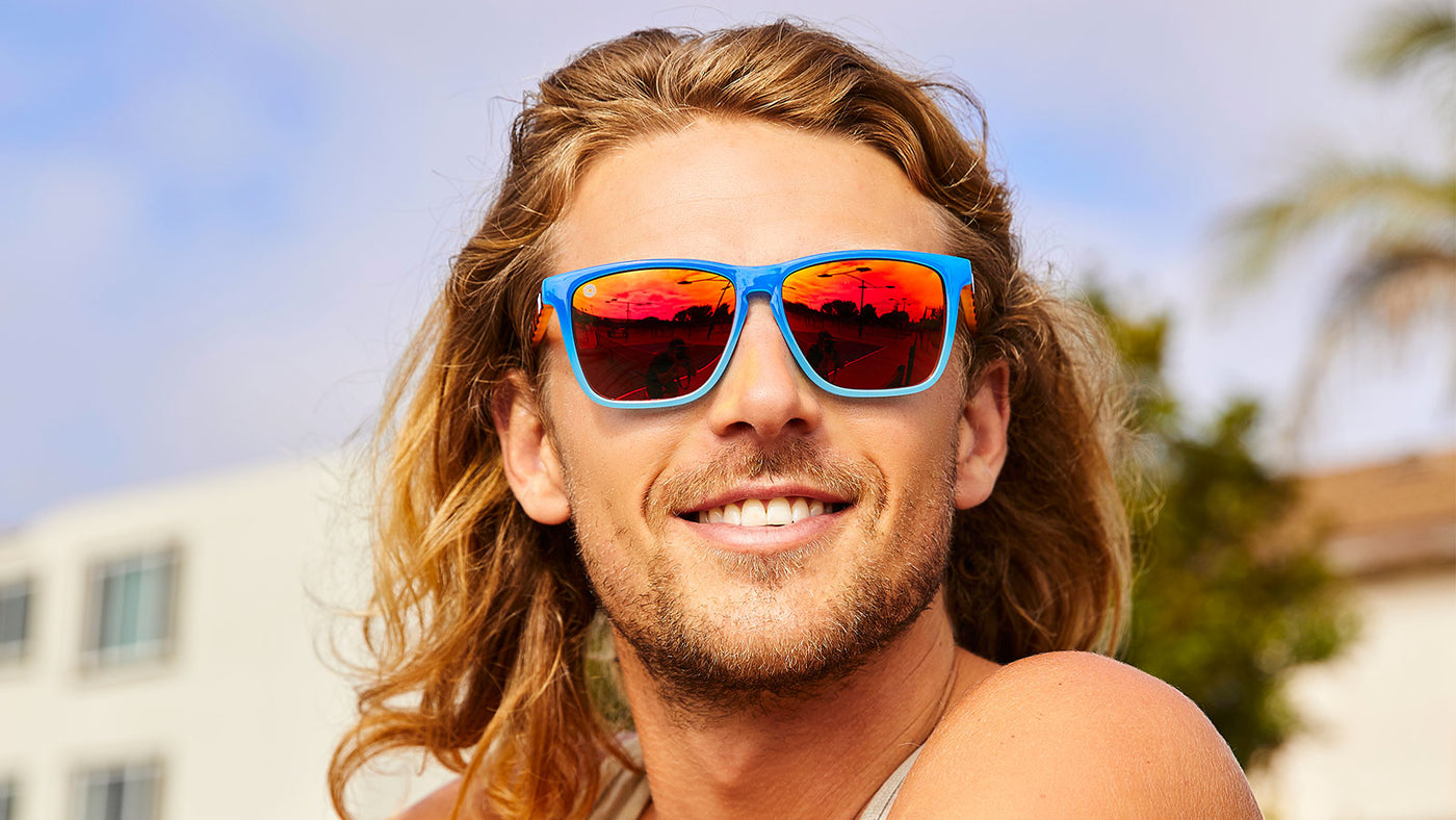 Sunglasses with Blue Frames and Polarized Red Lenses, Model