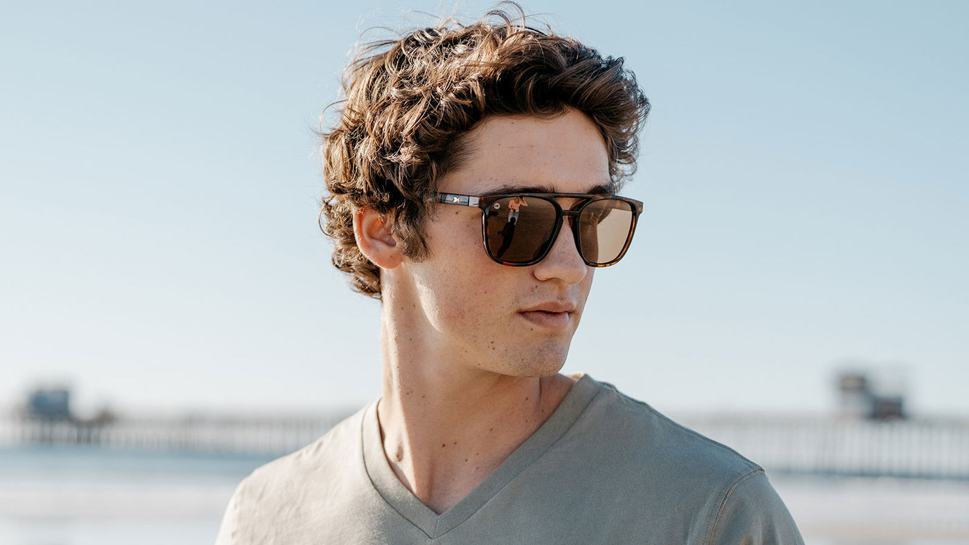 Sunglasses with Glossy Tortoise Shell Frames and Polarized Amber Lenses, Model