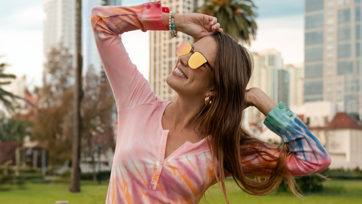 Woman wearing Hot Take Cloud Catchers sunglasses