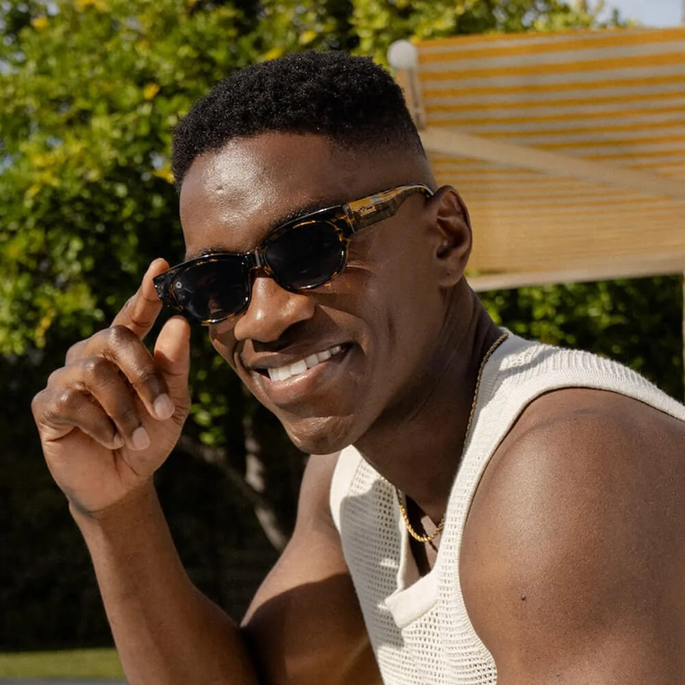 Man wearing Le Grand Amour Junipers sunglasses