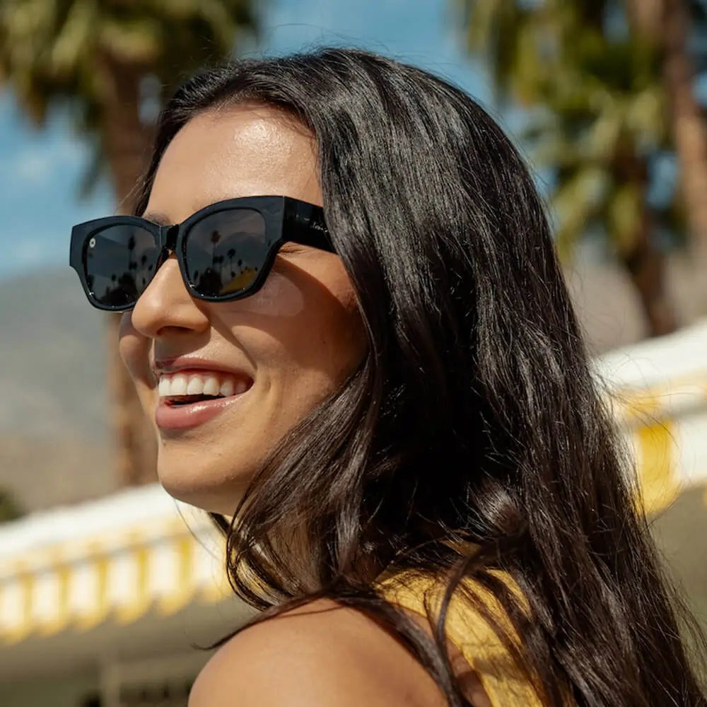 Woman wearing Piano Black Junipers sunglasses
