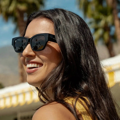 Woman wearing Piano Black Junipers sunglasses