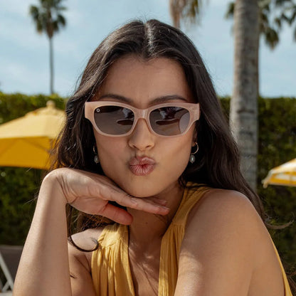 Woman wearing Vintage Rose Junipers sunglasses