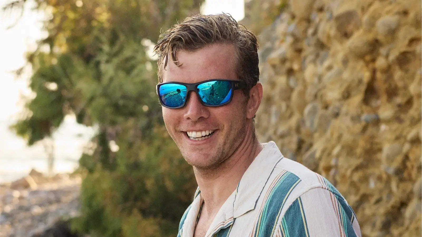 Men wearing Midnight Ocean High Stakes Sunglasses