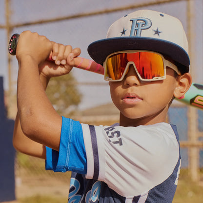 Boy wearing Sandstorm Kids Campeones Sunglasses